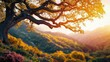 © Thamonchanok - Golden hour illuminates a majestic tree on a lush hillside.
