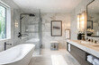 © NOOPIAN - A contemporary bathroom with a freestanding bathtub