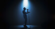 © Gorodenkoff - Portrait of a Handsome Young Man Singing a Song at a Music Contest. Cinematic Spotlight Creates a Silhouette Effect, His Charismatic Stage Presence and Lyrics Electrify the Stage