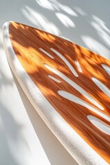 Poster - Close-up shot of a surfboard sitting on a table