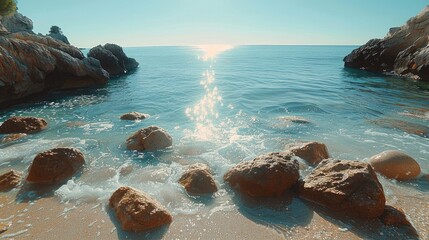 Poster - A beach with sun and rocks, very sunny, blue water, view on horizon.