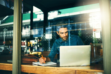 Fototapete - Laptop, window and businessman in cafe for writing notes, online research and planning project. Professional, remote work and person on computer for internet, website and proposal in coffee shop