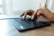 © Jelena Stanojkovic - Keyboard, hands and businesswoman in the office typing for legal research for a court case. Technology, career and closeup of professional female attorney working on a law project in modern workplace.