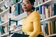 © BullRun - Intelligent African American student in library