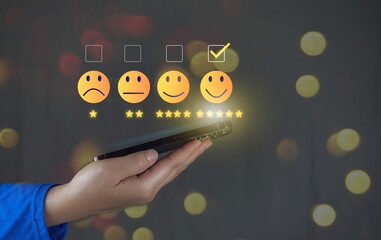 Wall Mural - Customer review satisfaction feedback survey concept. User give rating to service excellent experience on mobile phone application.