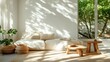 © JoxyAimages - A bright and airy living room with sunlight streaming in, featuring a white sofa, natural elements like a plant and a wicker basket, creating a serene environment.