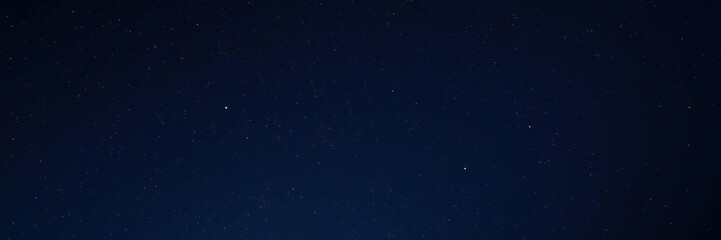 Wall Mural - an ethereal image of a deep blue night sky with countless stars and constellations visible against t