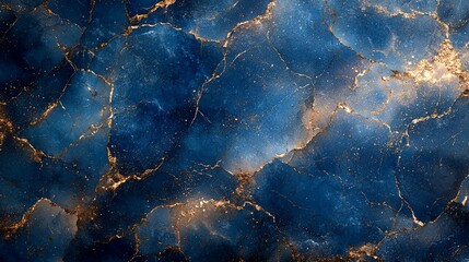  A textured blue and gold abstract background resembling a cosmic or geological surface.