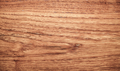 Wooden textured background with natural grain pattern and rough surface.