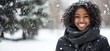 © k_viktar - Smiling woman in snow, winter scene, joyful expression, curly hair, warm scarf, snowfall, outdoor portrait, nature background