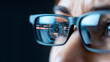 © VERTEX SPACE - image showcases close up of persons eye wearing glasses, with digital interface reflected in lenses, creating futuristic and tech savvy atmosphere