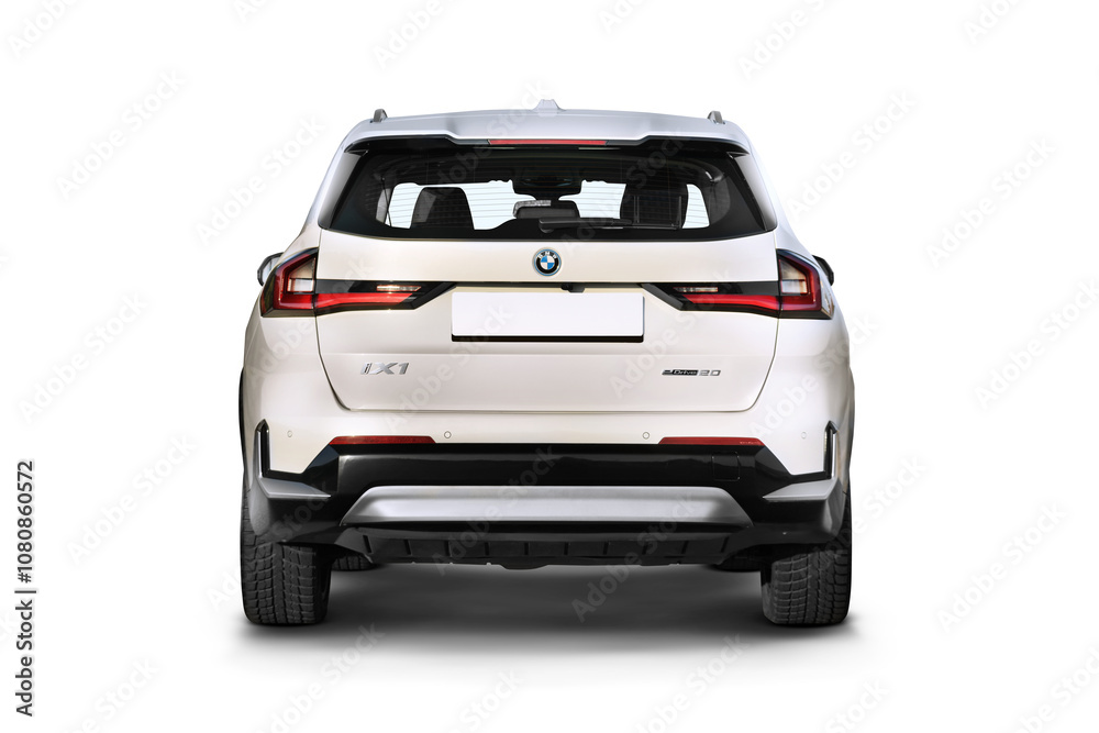 White Ix Rear Studio shot of a pearl white BMW IX1 e-drive electric SUV showcasing a ...