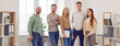 © Studio Romantic - Portrait of a confident cheerful young people group men and women wearing casual clothes looking at camera and smiling standing in office. Company employees or students standing in a row. Banner.