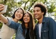 © Running opossum - Multiracial group of cheerful young adult friends taking a selfie together with a smartphone in park