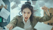 © Mehran - A young Asian woman in the office is furiously throwing papers around her desk. She looks angry and frustrated, as if she is under a lot of stress and pressure.