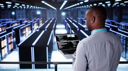 Leinwandbilder - Happy Engineer In Data Center Server Room Configuring AI