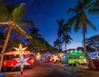 © IrenaBlechova - vibrant parol stars adorn festive streets lanterns aglow amidst palm trees and jeepneys capturing the unique fusion of christmas joy in the tropical philippine landscape