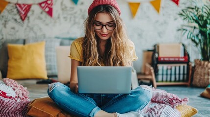 Young woman using laptop in cozy setting