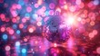 © video - Colorful disco ball radiating vibrant lights with bokeh background creating festive and exciting atmosphere for party celebration
