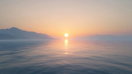 Wall Mural - Tranquil ocean sunrise with mountains in background