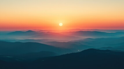 Wall Mural - Majestic sunrise over misty mountains showcasing vibrant colors and tranquil beauty