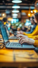 Poster - Professionals engaged in systems integration work collaboratively in a modern office, utilizing laptops amidst ambient lighting in the evening