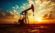 © Kim - Oil pump jack silhouette at sunset, symbol of energy industry and resource extraction