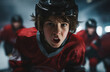 © Katewaree - Young hockey player in motion displaying determination on ice rink with team