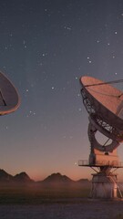 Wall Mural - Vertical Establishing Shot of a Large Radio Telescope in the Desert at Dusk with a Starry Night Sky Above