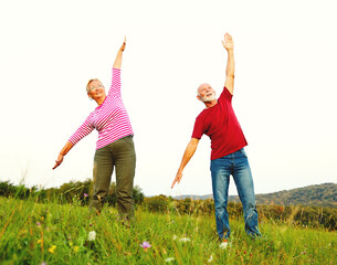 Wall Mural - outdoor senior fitness woman man lifestyle active sport exercise healthy fit retirement stretching e