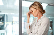 © peopleimages.com - Stress, business and mature woman in office with worry for financial crisis and mistake. Burnout, corporate and person with anxiety, frustrated and upset for bankruptcy, failure or unemployment risk