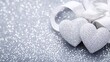 © Wor - Sparkling Silver Hearts on Shimmering Background with Elegant Satin Ribbon Perfect for Valentine's Day, Romantic Celebrations, or Wedding Decorations