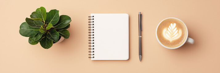 Canvas Print - minimalist workspace featuring white notebook, pen, coffee cup with latte art, and green plant. This serene setup inspires creativity and productivity