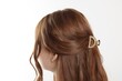 © New Africa - Teenage girl with stylish hair clip on white background, back view