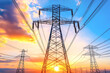 © Mayava - High voltage power lines stretching across a landscape, with transmission towers supporting the wires