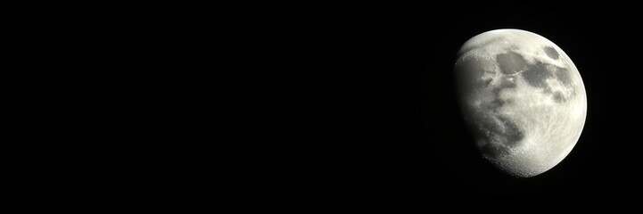 Wall Mural - a breathtaking vista of the full moon suspended in the blackness of space with its cratered surface 