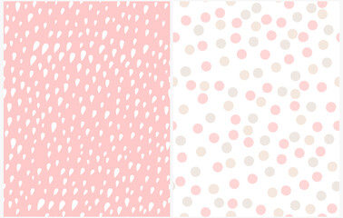 Wall Mural - cute hand drawn abstract irregular geometric vector patterns. gray and pink brush polka dots on a wh