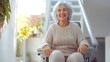 © bvbflo1 - Happy older woman sitting on stair lift with copy space