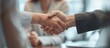 © best - Business partnership meeting with handshake in office