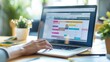 © suteeda - A social media manager using a laptop to schedule posts across multiple platforms, with a content calendar and scheduling tool visible on the screen