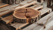 © JamesTeo - A rustic wooden slice, showcasing the intricate grain patterns and weathered bark of a walnut tree, rests atop weathered wooden planks in a carpenter's workshop. Ideal for natural and earthy design pr