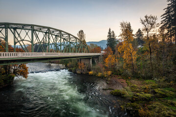 Wall Mural - Bridge over the North Fork Santiam River in autumn season. Mill City, Oregon