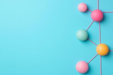 Poster - Abstract arrangement of colorful spheres connected by lines on a light blue background, representing interconnectedness and creativity.