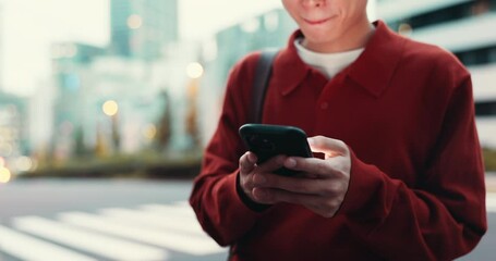 Japanese, person and city with smartphone for message, connection and social media for traveler. Road, man hands and travel with mobile app for booking taxi, online request or smile at night in Tokyo