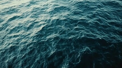 Aufkleber - Tranquil Sea Surface with Gentle Waves Under Sunlight, Creating a Serene Blue Water Scene for Calmness and Relaxation in Nature