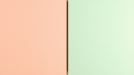 Poster - Two sheets of pastel-colored paper, one peach and one green, are positioned side by side, creating a visually appealing split-color effect that is ideal for backgrounds or design elements