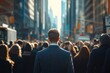 © Imagentive - Man in Suit Walking on Busy City Sidewalk at Midday