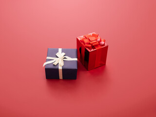 Festively styled gift boxes in vibrant red and blue colors, perfect for various celebrations and special occasions