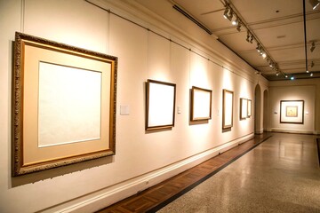 Poster - Vintage Style Photography of a Minimalist Gallery Wall Featuring Four Blank Frames in a Clean Design with Subtle Textures for a Contemporary Art Space Concept