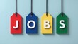 © ANDREY PROFOTO - Minimalist jobs concept with colorful hanging tags on light blue background